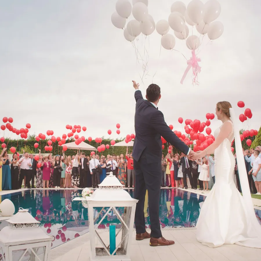 Couple celebrating with balloons